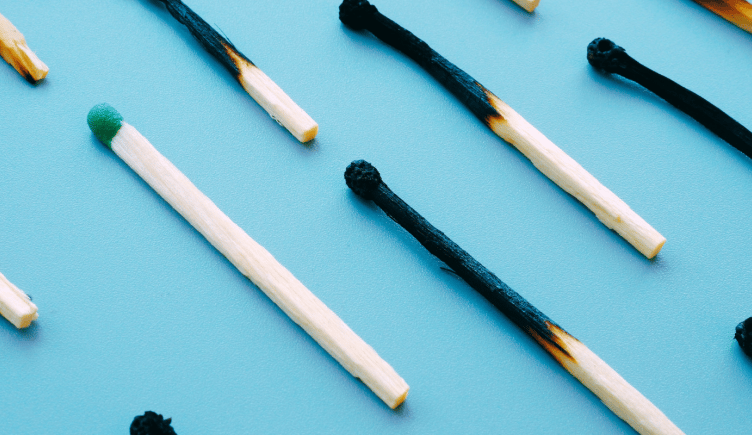 Burnt matches showing that we can all experience burnout at work.