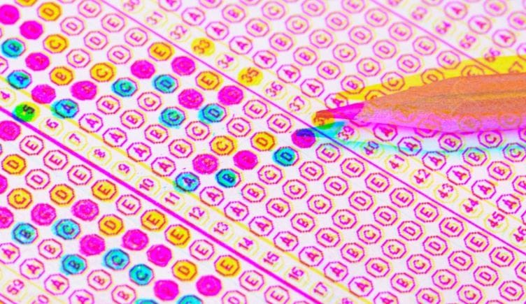 A personality test scantron with bubble filled in with different colors representing the different personality results.