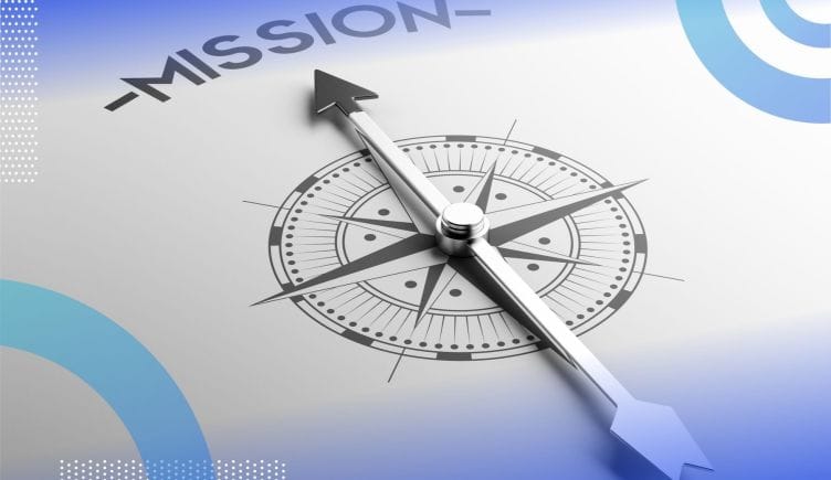 A compass points toward the word “mission.” /company-culture/3-reasons-mission-over-profit
