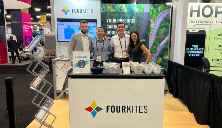 Team members at the FourKites booth a a trade expo