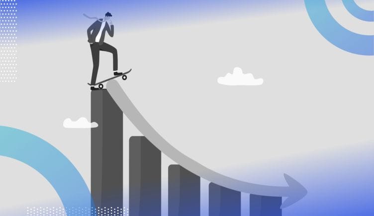 A man on a skateboard prepares to slide down a trend-line set over a decreasing set of rectangular shapes, as in a bar chart. /people-management/5-ways-help-navigate-economic-uncertainty