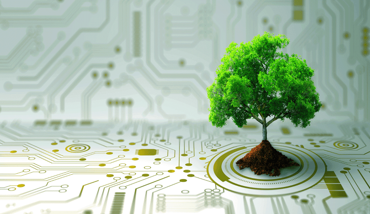A tree growing out of a surface covered in tech symbols representing carbon neutrality.