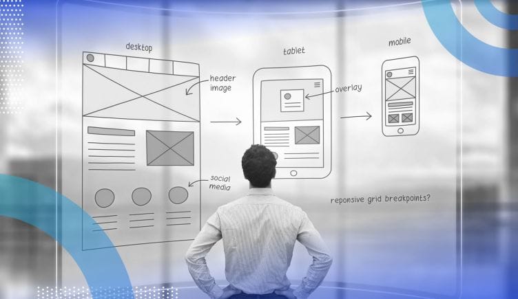user interface design imageA view of a man from behind as he looks at UI prototype diagrams