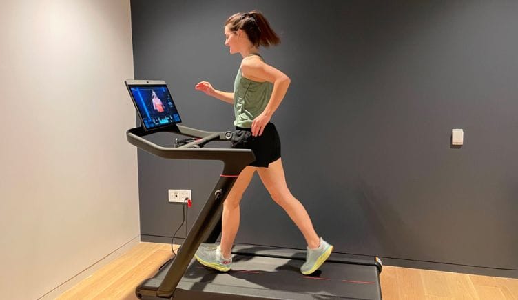 Peloton team member running on a treadmill