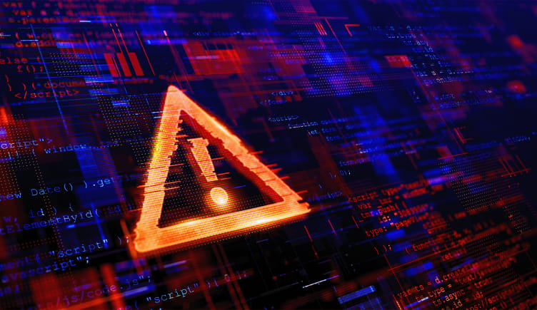 A glowing caution sign above code reporting different types of cyber attacks.