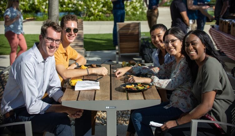 Paylocity team members having lunch together outside