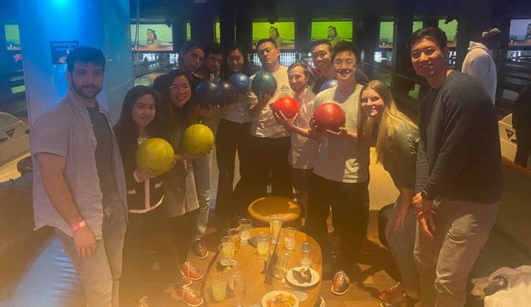 Pulse Analytics team members bowling