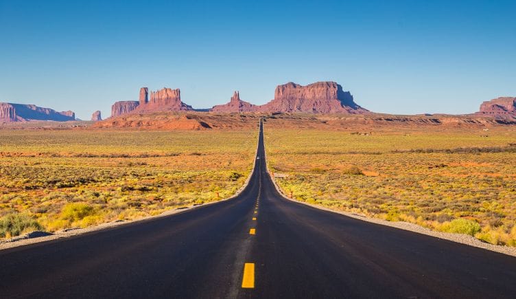 An Arizona highway stretches into the horizon. 