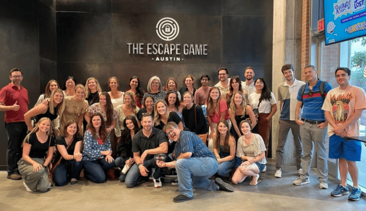 khoros company group photo at an escape room game location