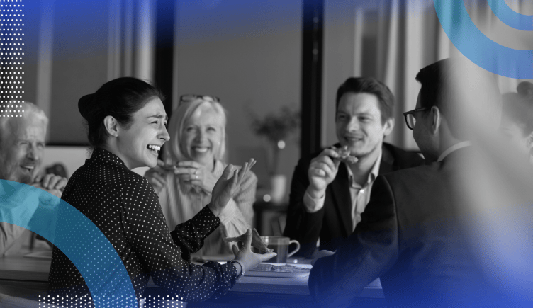 Employee relations image of a group of employees interacting and laughing in a casual atmosphere — maybe a coffee, lunch or happy hour.