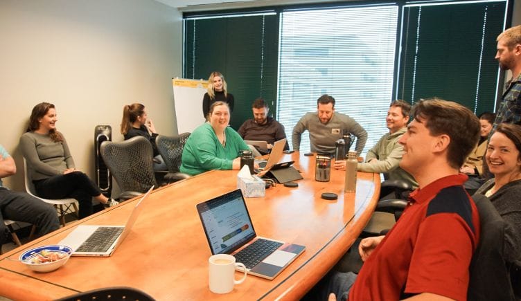 A group of Nymbl Science employees during a meeting.