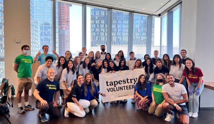 A group of Tapestry employees during a volunteering event.