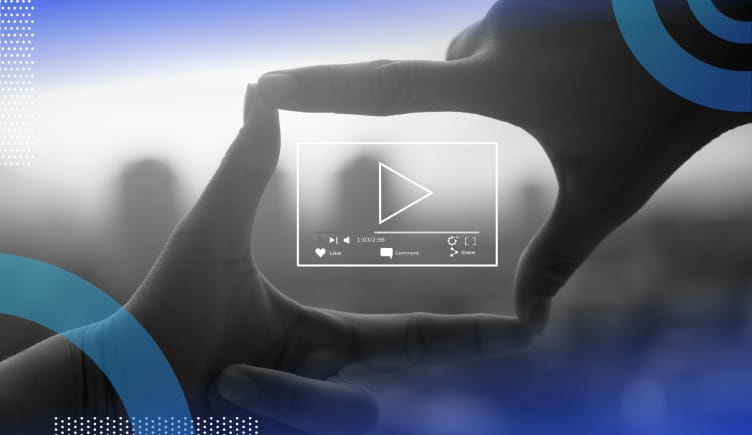 Video marketing image of two hands creating a square with their fingers with a rectangle and play button in between them.