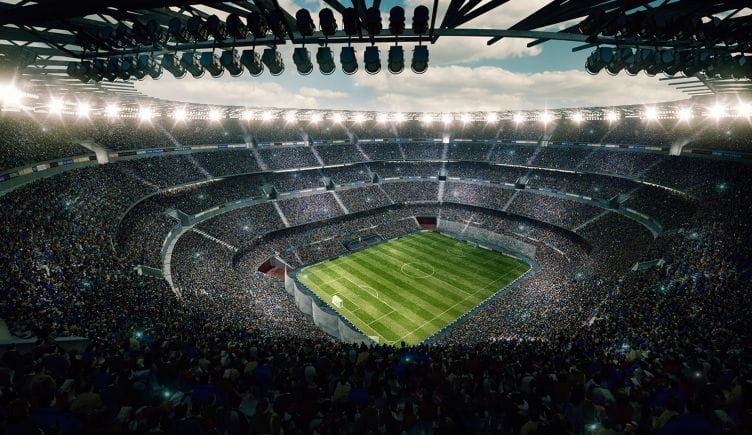 photo of a big sports stadium shot from the audience stands