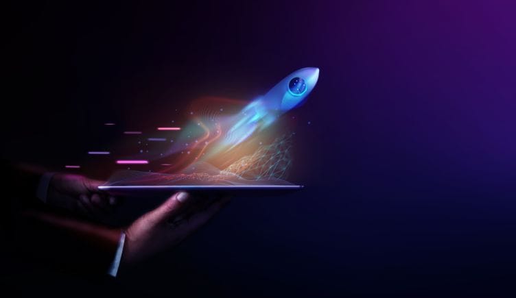 A concept image of a rocket taking off from a tablet among small graphics of an app elevated in 3D