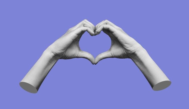 Two hands make a heart symbol in front of a purple background.