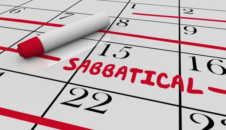 Sabbatical leave is marked off on a calendar in red ink.