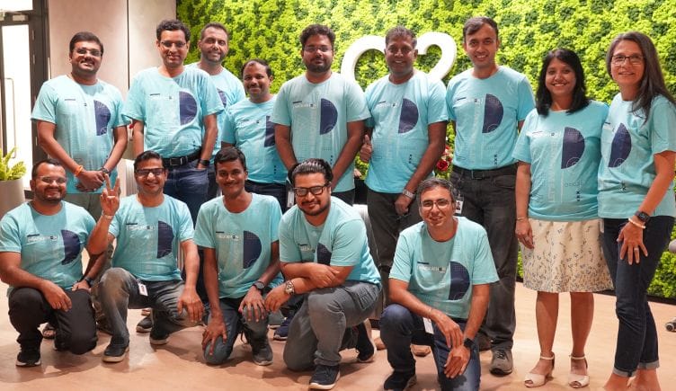  A group photo of Q2 team members at the company’s Bangalore hackathon.