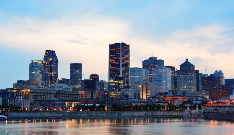 A view of the Montreal skyline at sunset.
