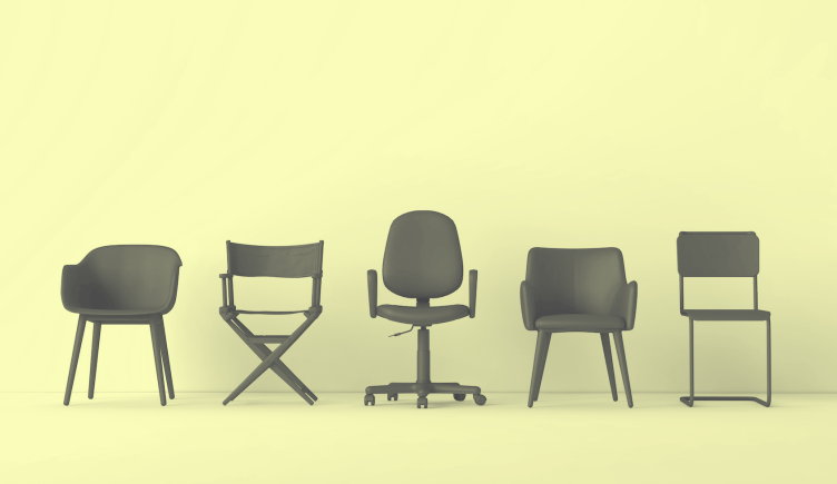 A row of different office chairs.