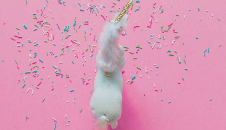 unicorn surrounded by confetti