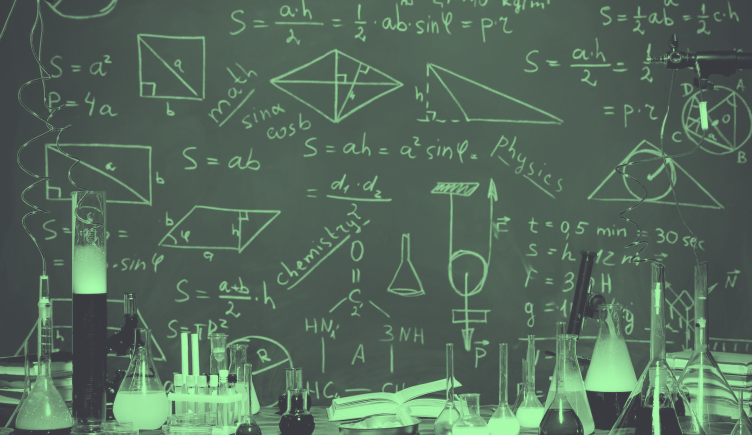 Lab equipment and a chalk board with equations