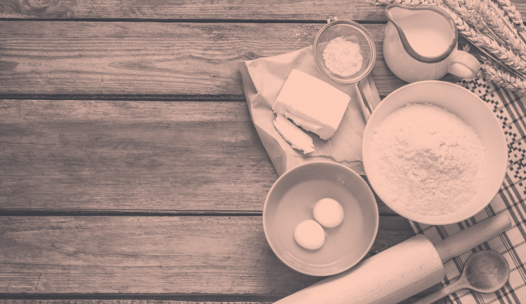 Eggs, flour, butter, a rolling pin, and other baking ingredients 