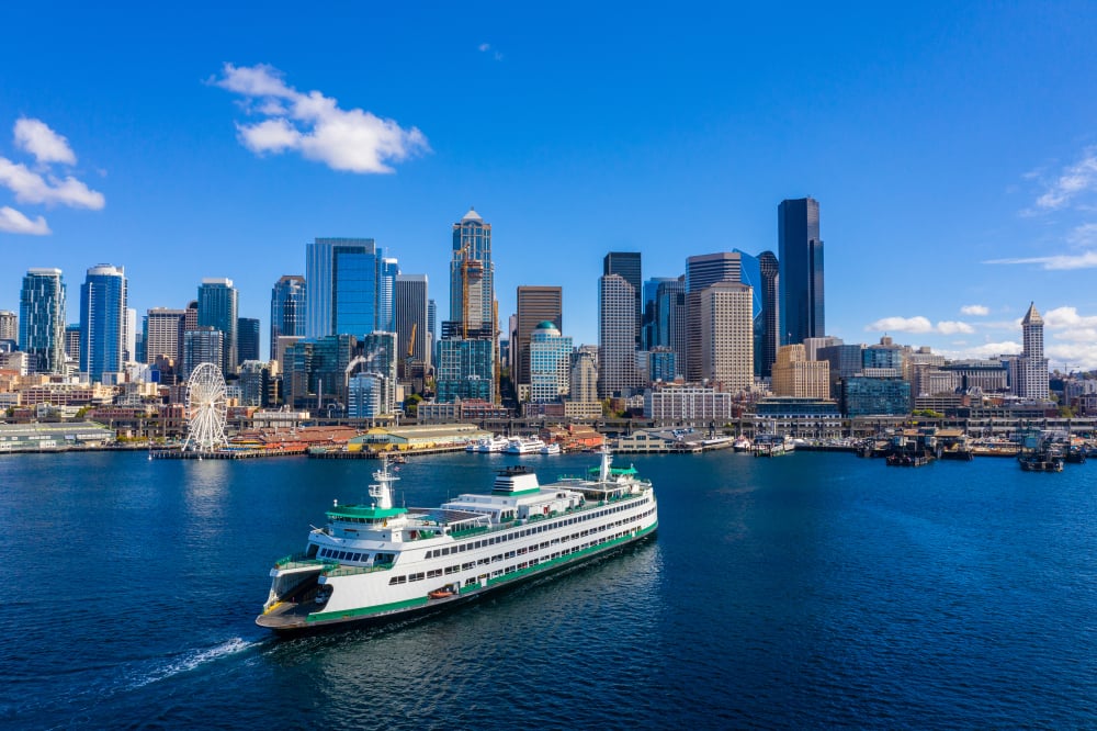 A photo of the Seattle skyline is pictured.