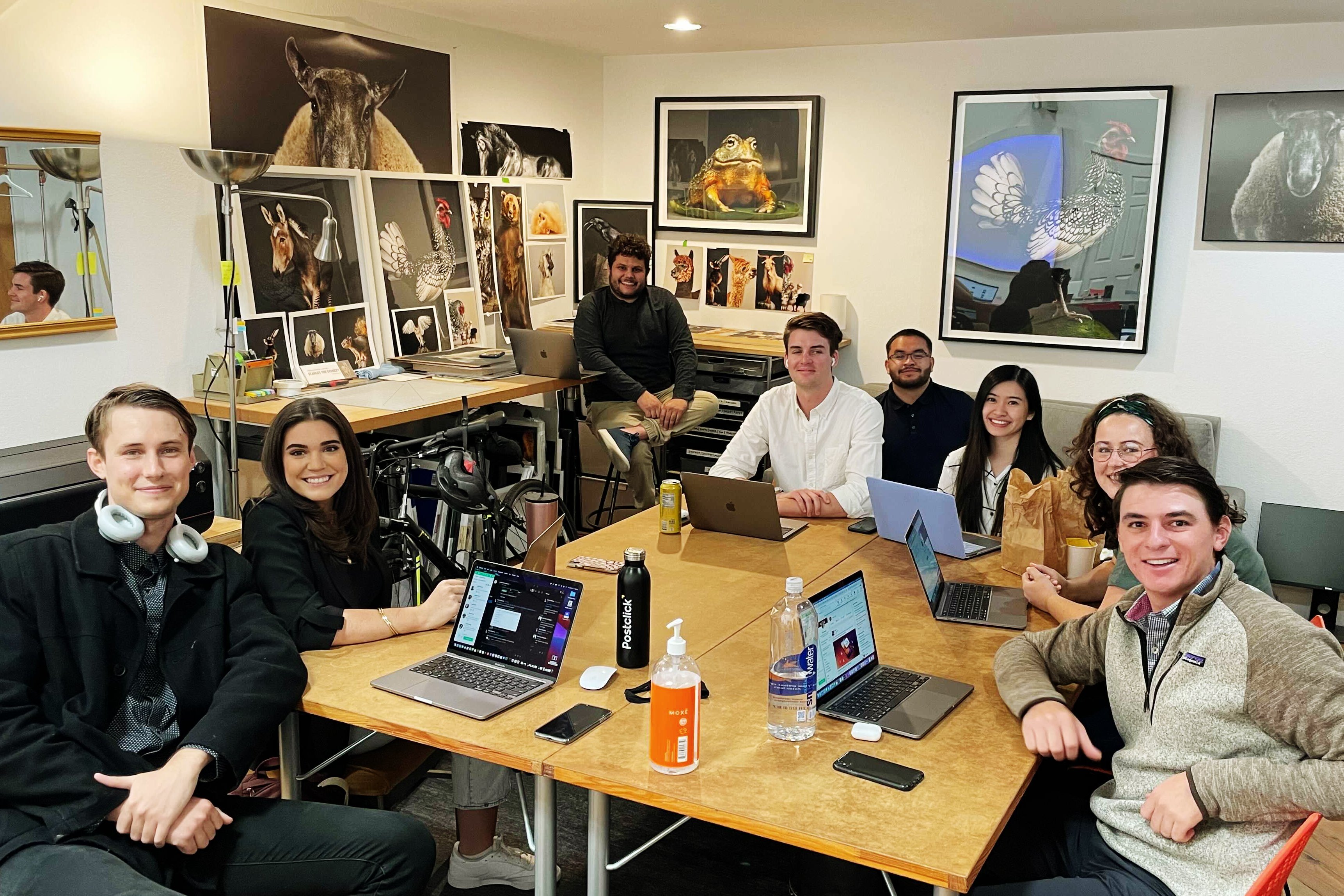 Instapage team gathers around a conference table