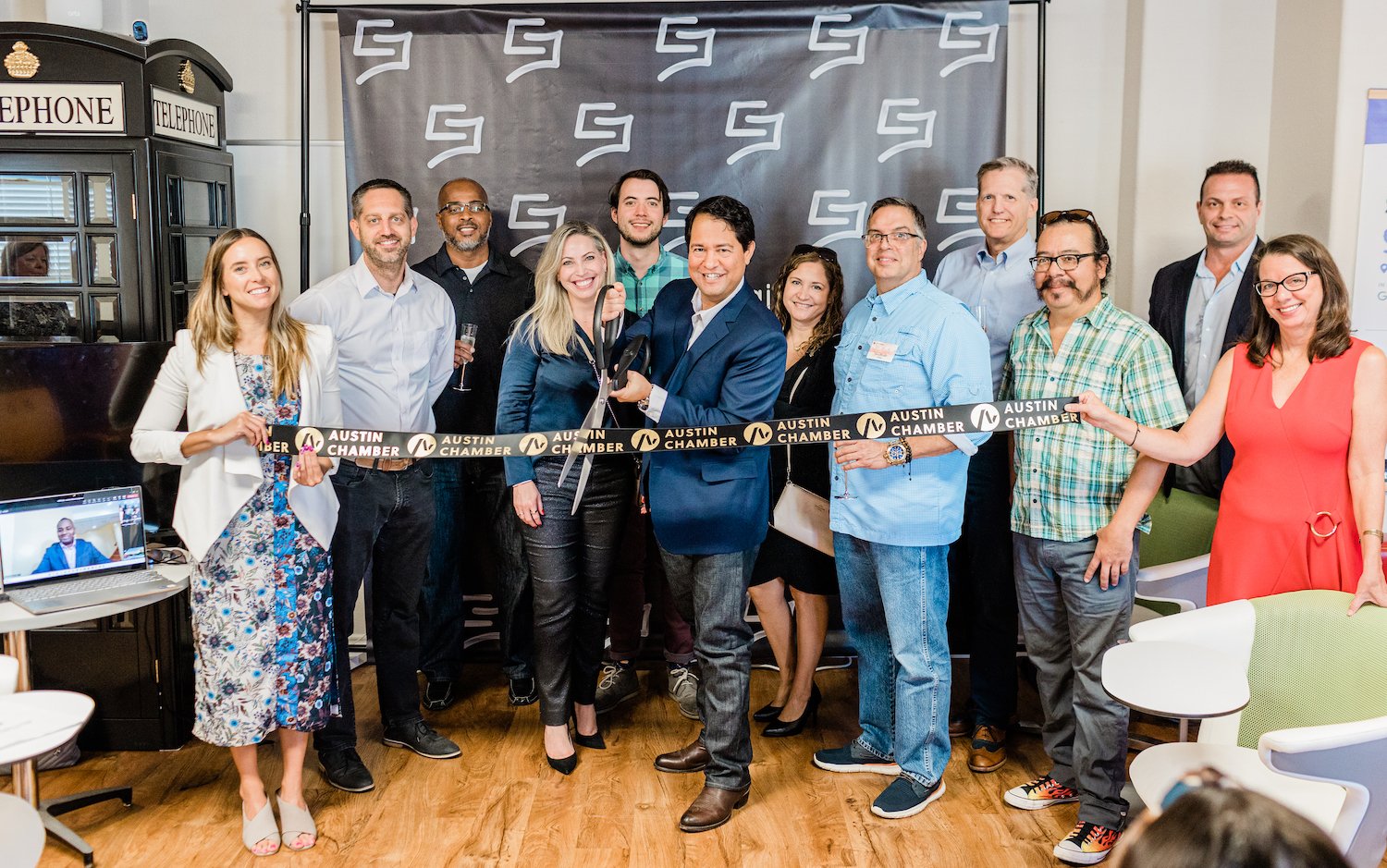 Macami co-founder andCEO Carlos Martin cuts the ribbon at a launch celebration featuring members of the Austin Chamber of Commerce and Austin Tech Council. | Photo: Macami.ai