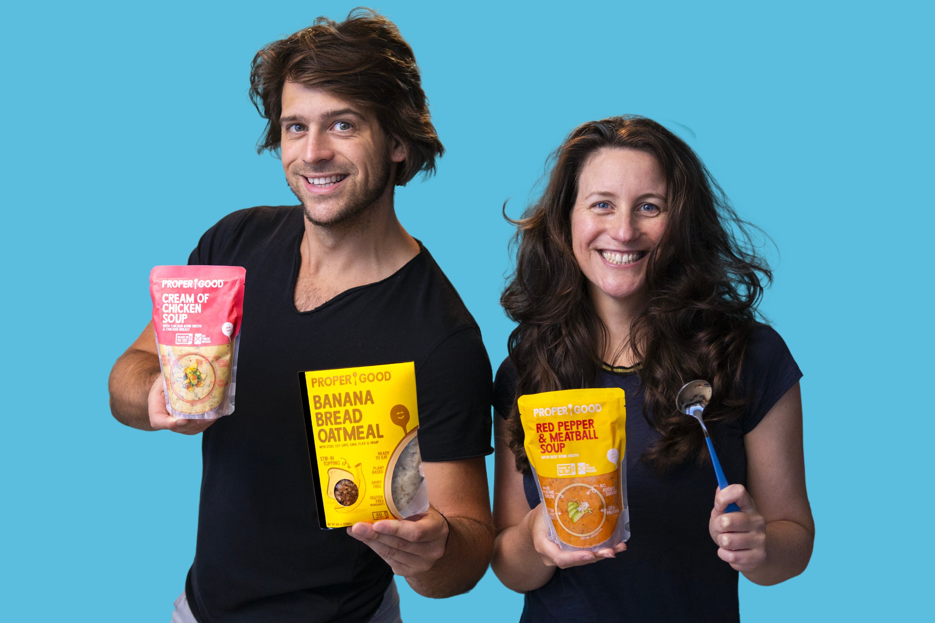PROPER GOOD co-founders and siblings Christopher and Jennifer Jane hold products