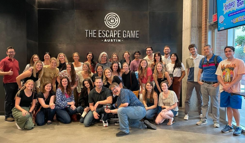 khoros company group photo at an escape room game location