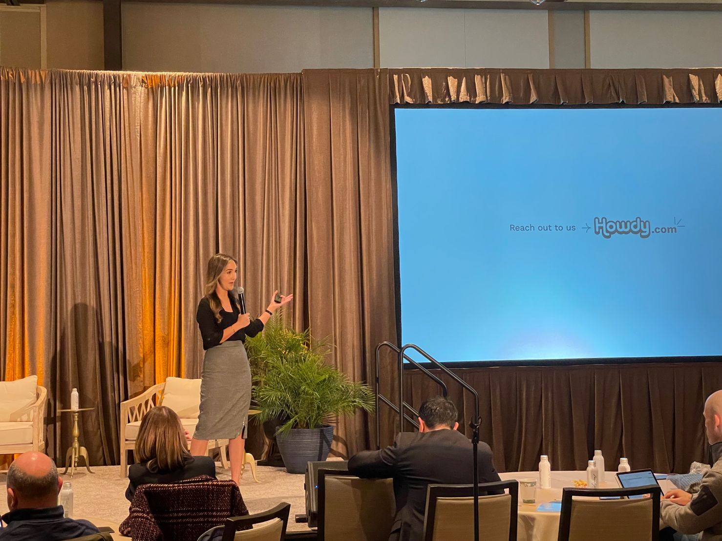 Howdy founder and CEO Jacqueline Samira speaks at an event.