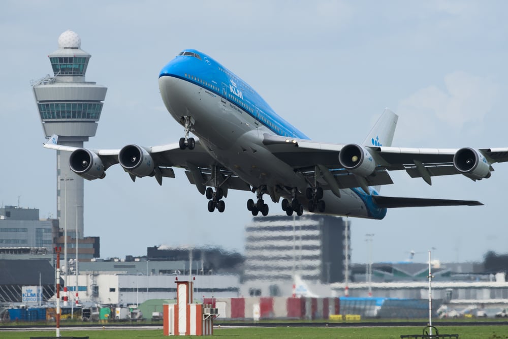 747 Taking off on a runway in Amsterdam.