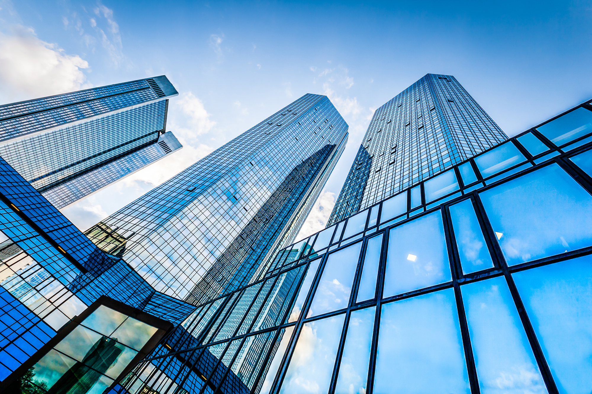 A ground-level shot of high-rise buildings