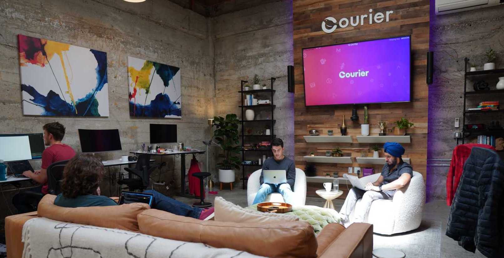 Courier office with employees working in communal space