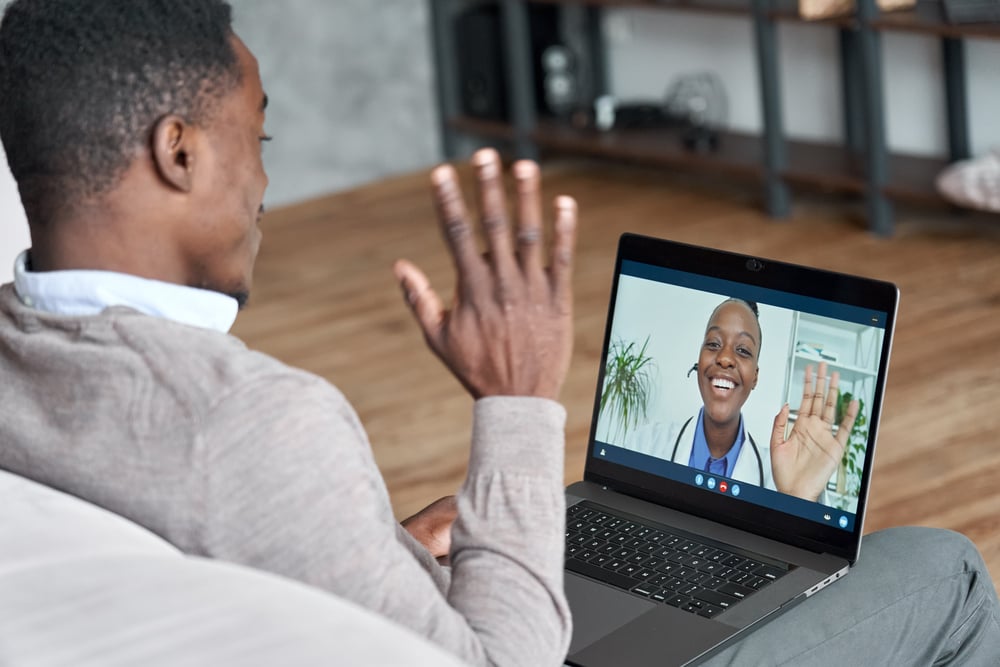 A patient meets with a therapist via a telehealth platform.