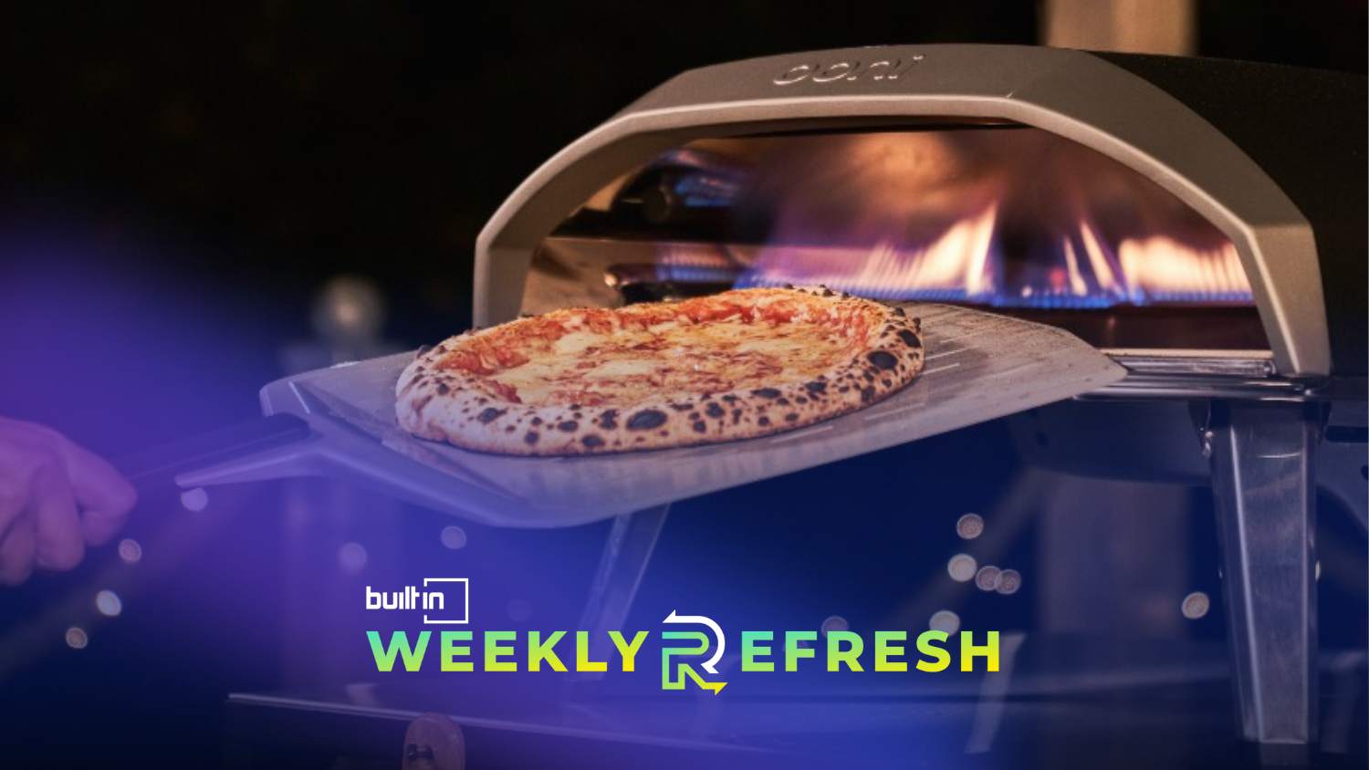 An Ooni oven cooking a pizza.