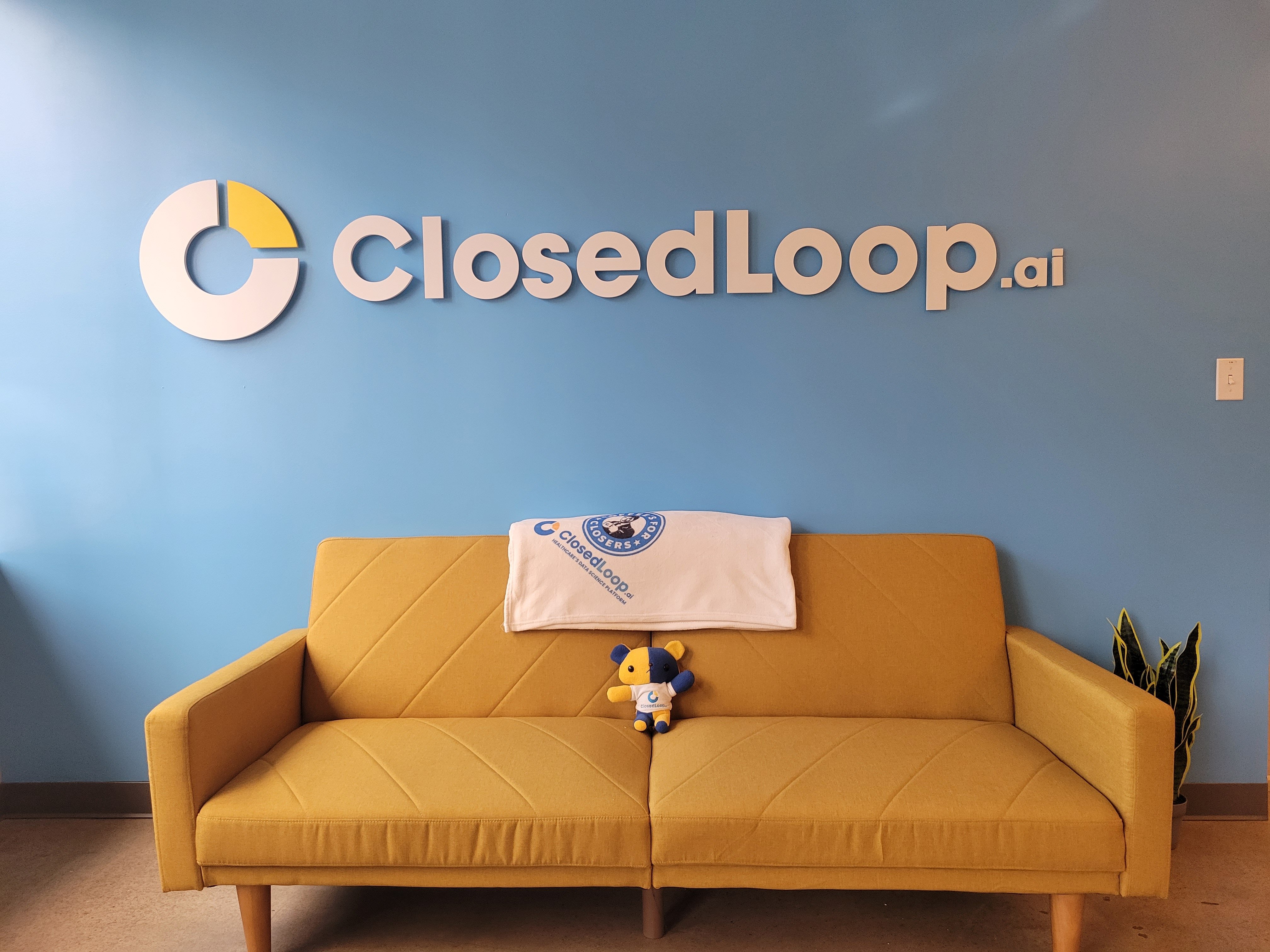 A photo of a couch in the ClosedLoop office