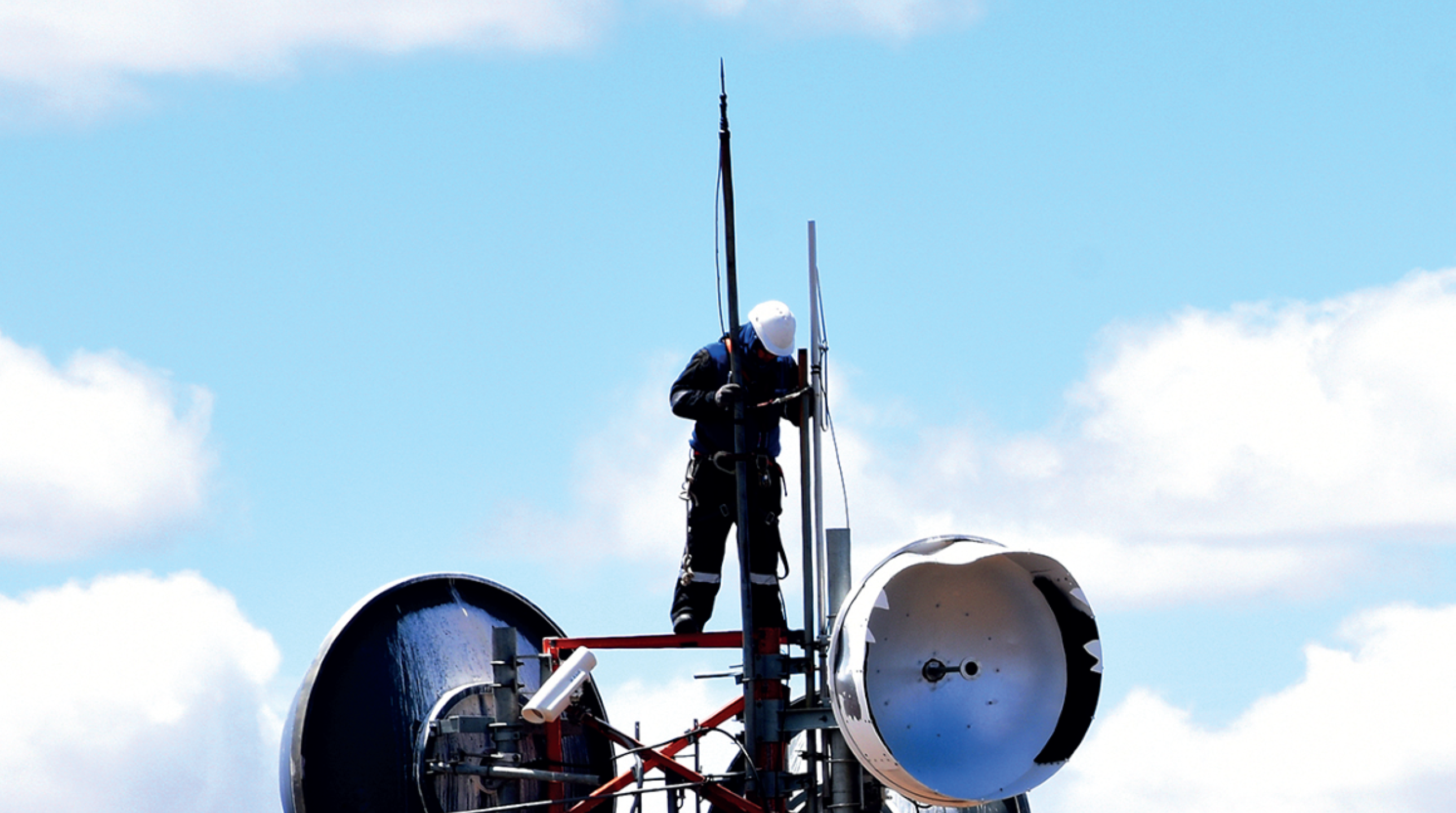 Motorola Solutions employees go above and beyond day in and day out, as shown by this team member working on a mission-critical network.