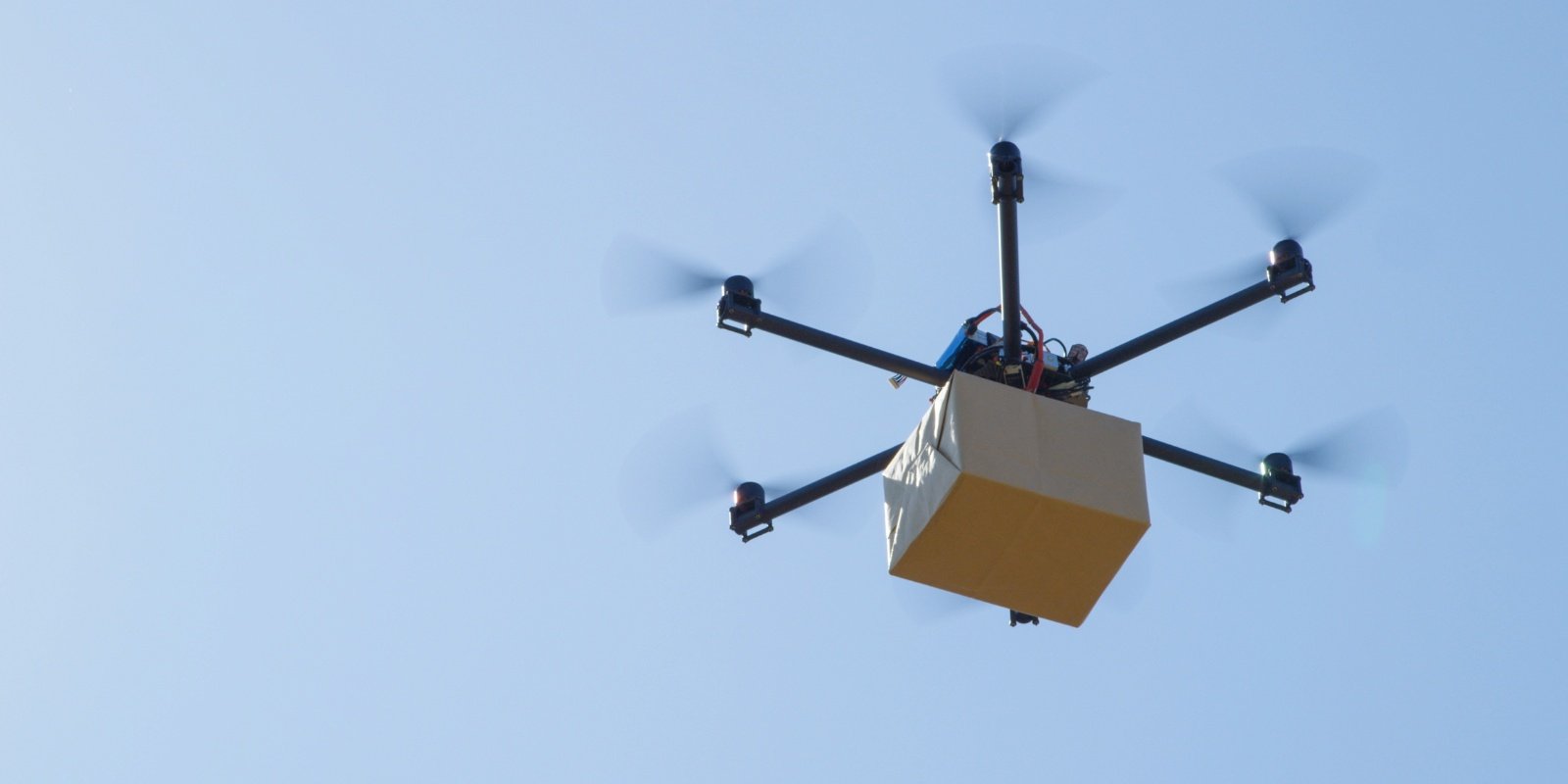 drone carrying package
