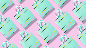 pastel-colored shopping bags arranged in a pattern