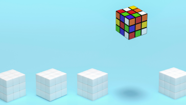 Mixed up Rubik's cube floating above all white Rubik's cubes