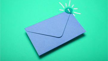 A blue envelope with a new email alert, best marketing newsletters