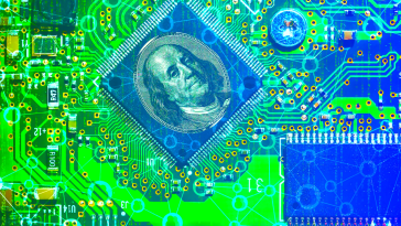 Benjamin Franklin from the 100 dollar bill superimposed on a computer processor representing the rise in fintech jobs.