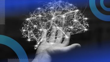 hand holding a brain representing neural network