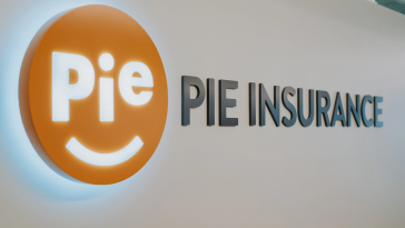 logo and company sign of pie insurance, with white letters in an orange circle