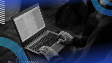 Linux image of a person's hands on a laptop with the screen open