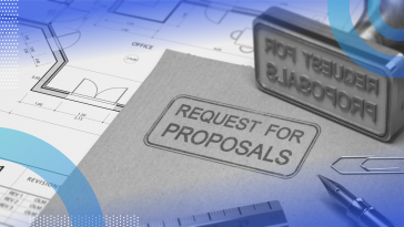 RFP image of a folder on a desk with a stamp on it that says requests for proposals