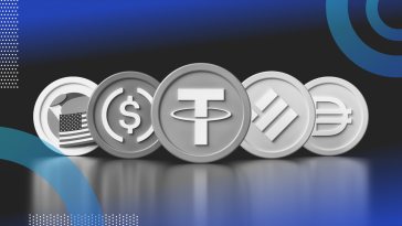 Stablecoins image of five different coins standing vertically with stablecoin logos on each